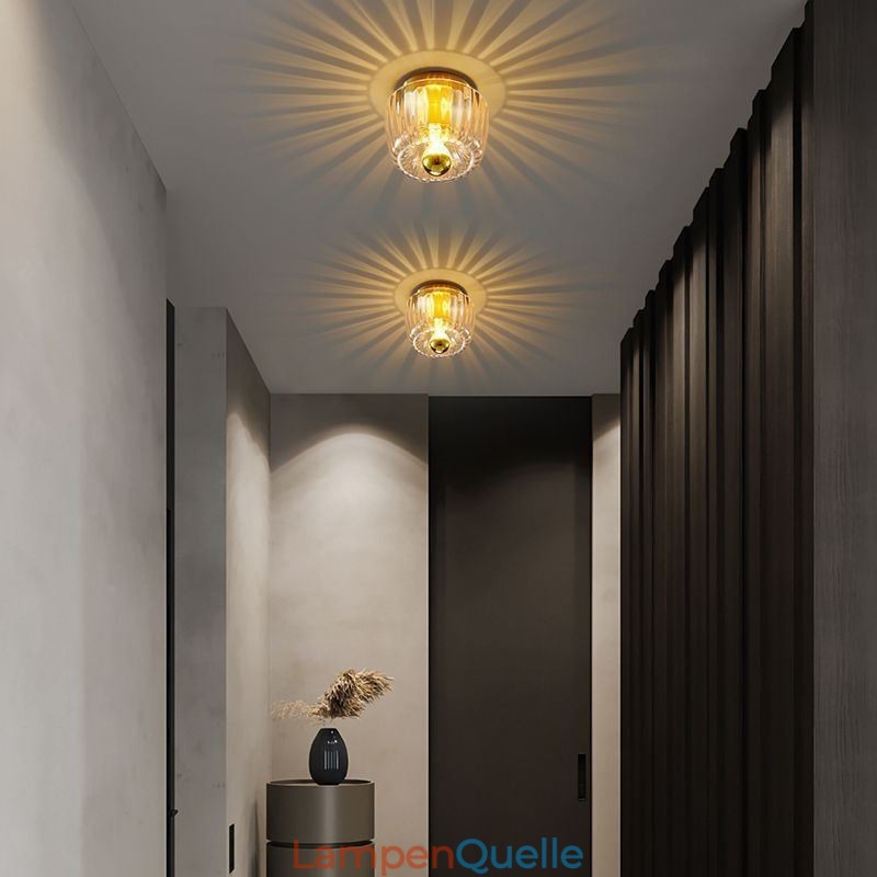 Moderne Wandbeleuchtung mit klarem Glasschirm, gebürstete Wandleuchte